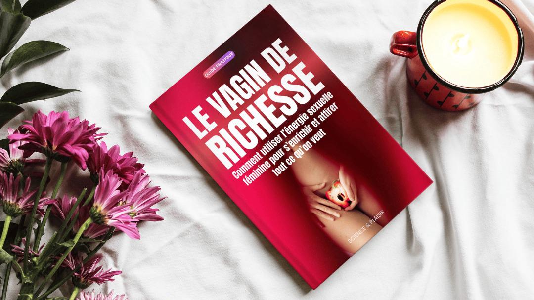 Le guide Le Vagin de Richesse sur un drap blanc